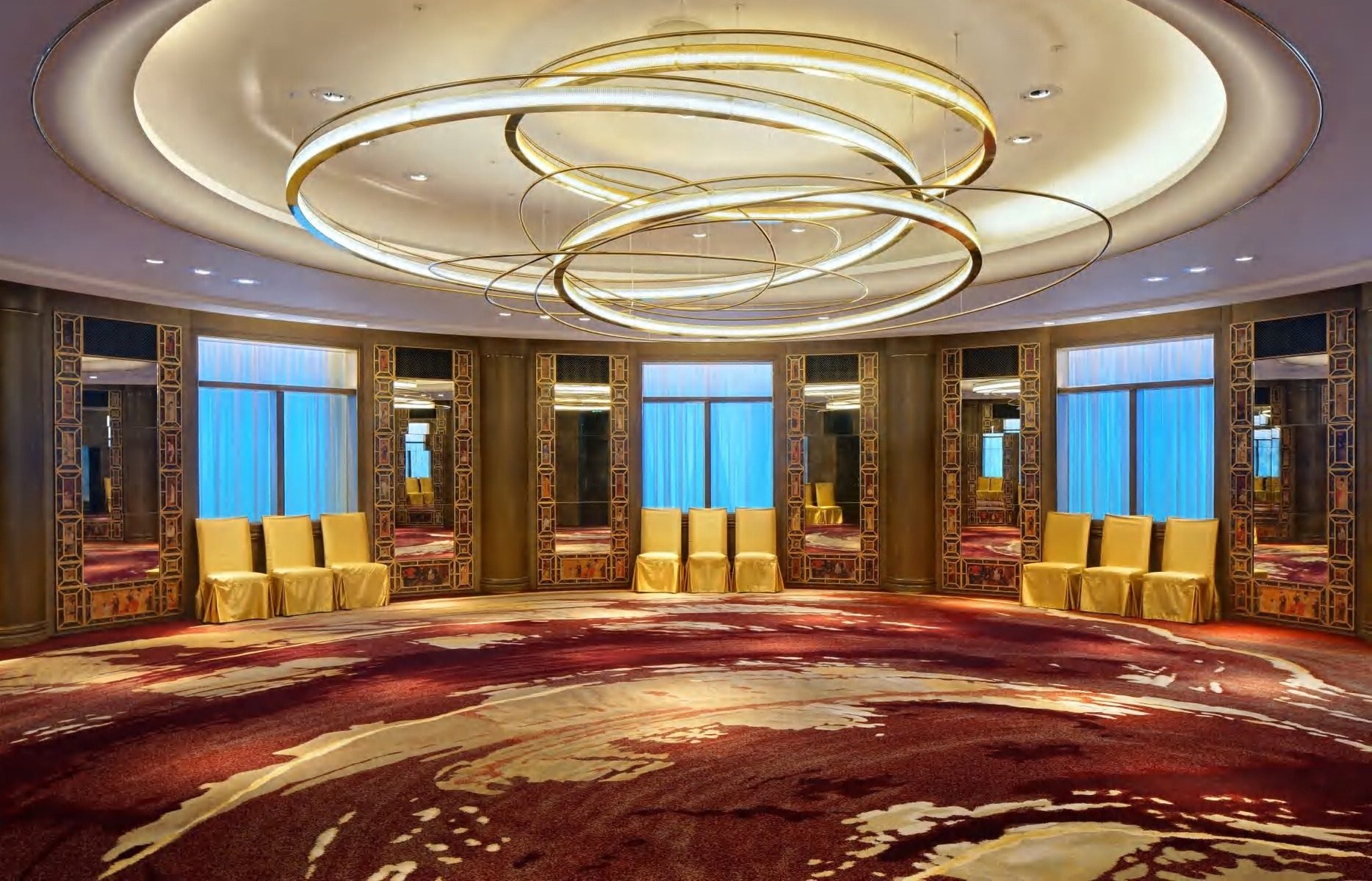 A finished TSK chandelier installed in a ballroom